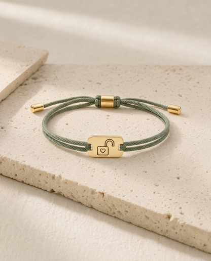 The Single status bracelet, sage green cord, gold tag