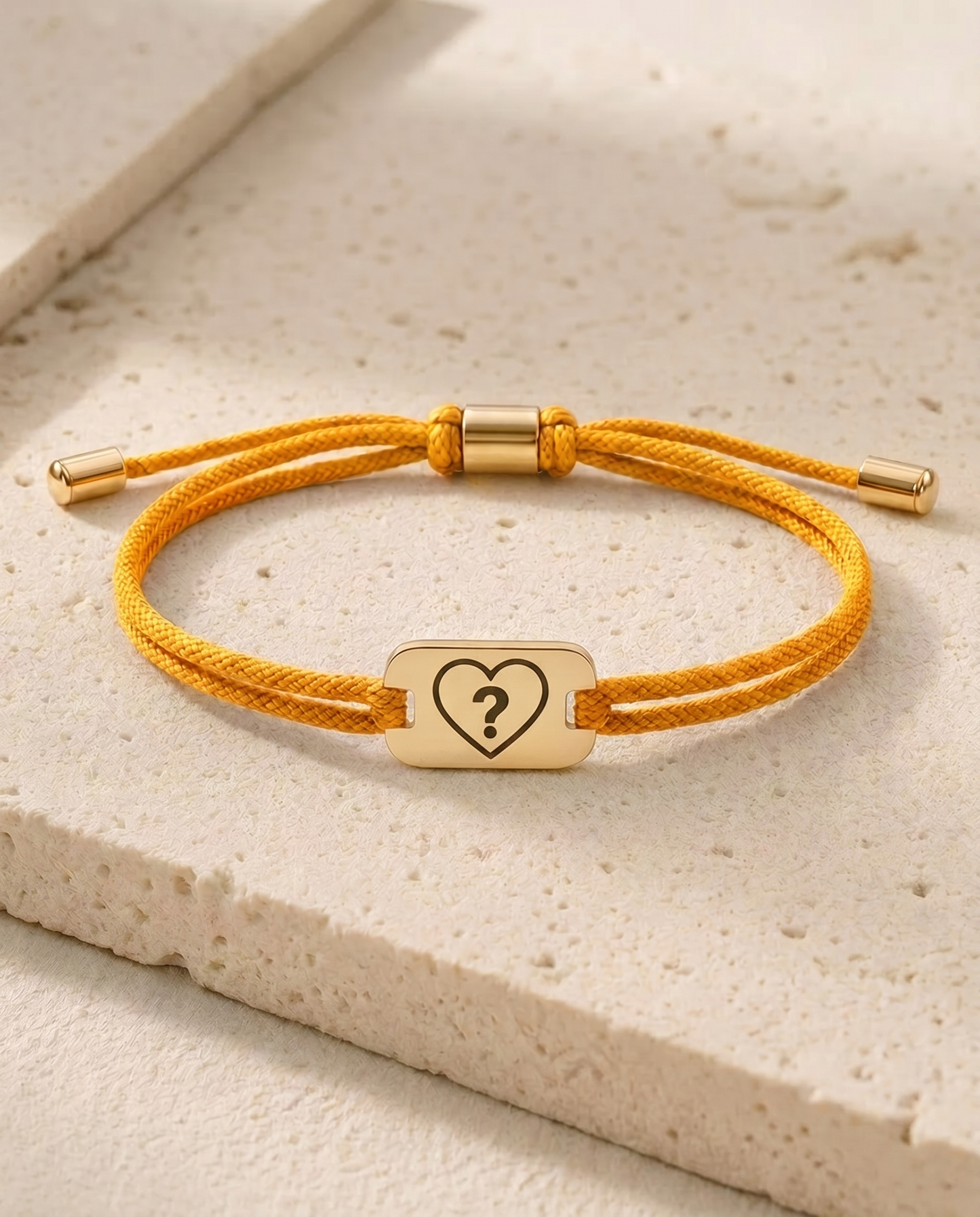 The Complicated status bracelet, golden cord, gold tag